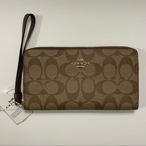 COACH LARGE PHONE WALLET IN SIGNATURE CANVAS WITH WRISTLET